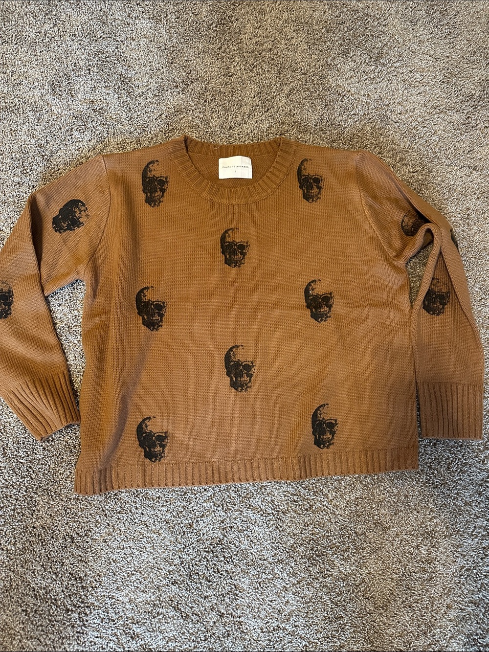 Cozy Sweater with Black Skull Motif